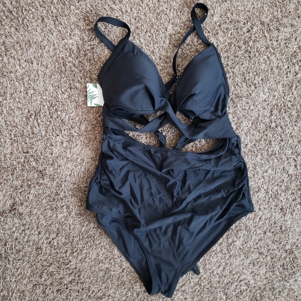 New one piece strappy padded swimsuit